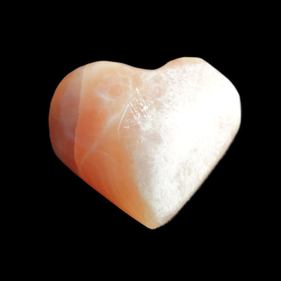 Honey Calcite heart 36mm 35.8g in sunlight - Rocks and Things Store