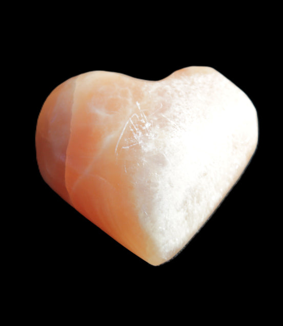 Honey Calcite heart 36mm 35.8g in sunlight - Rocks and Things Store