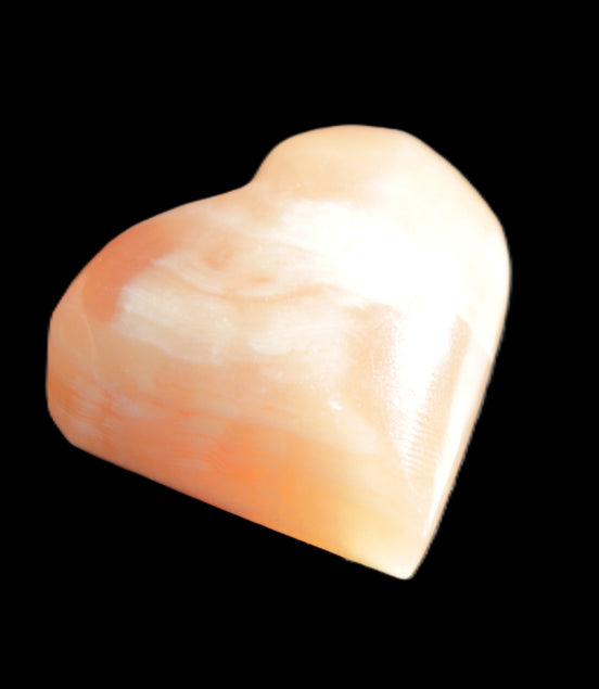 Honey Calcite heart 36mm 35.8g in sunlight - Rocks and Things Store