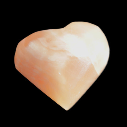 Honey Calcite heart 36mm 35.8g in sunlight - Rocks and Things Store