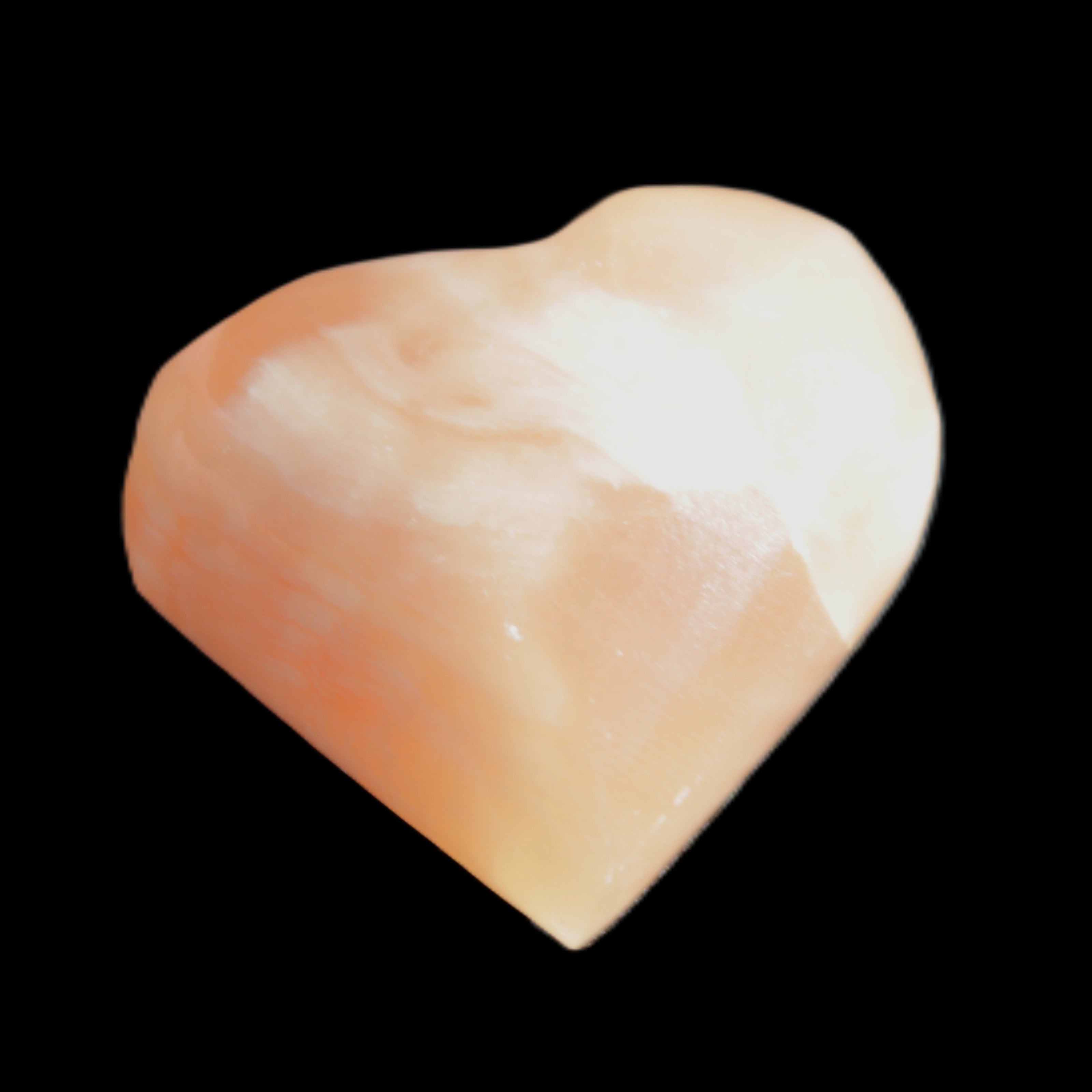 Honey Calcite heart 36mm 35.8g in sunlight - Rocks and Things Store