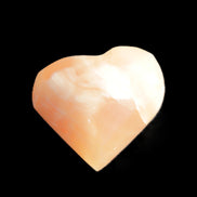 Honey Calcite heart 36mm 35.8g in sunlight - Rocks and Things Store