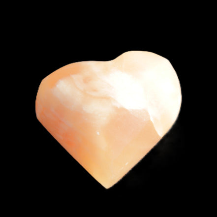 Honey Calcite heart 36mm 35.8g in sunlight - Rocks and Things Store