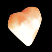Honey Calcite heart 36mm 35.8g in sunlight - Rocks and Things Store