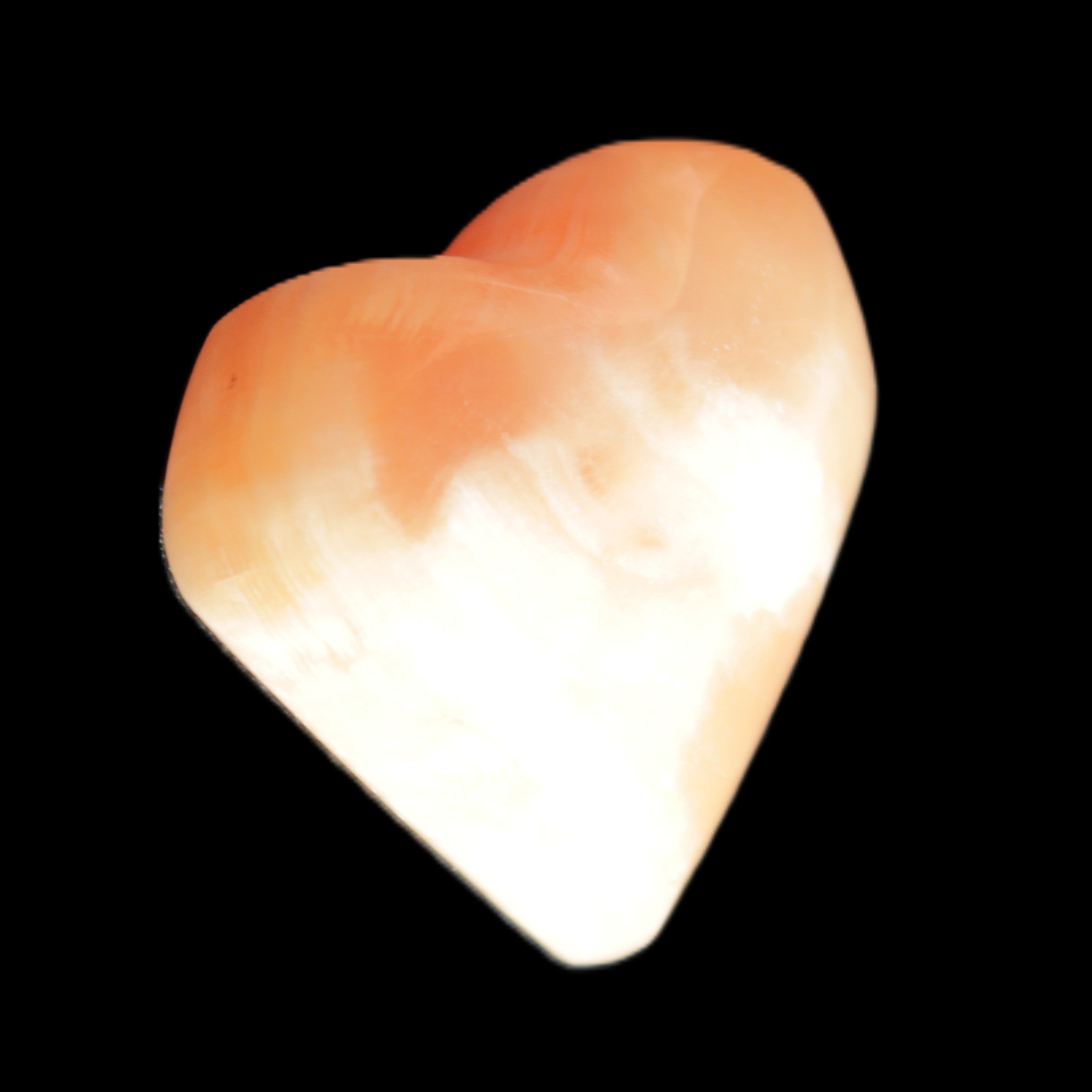Honey Calcite heart 36mm 35.8g in sunlight - Rocks and Things Store