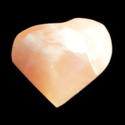 Honey Calcite heart 36mm 35.8g in sunlight - Rocks and Things Store