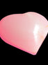 Pink-dyed Calcite heart 55*56mm 124.6g in sunlight - Rocks and Things Store