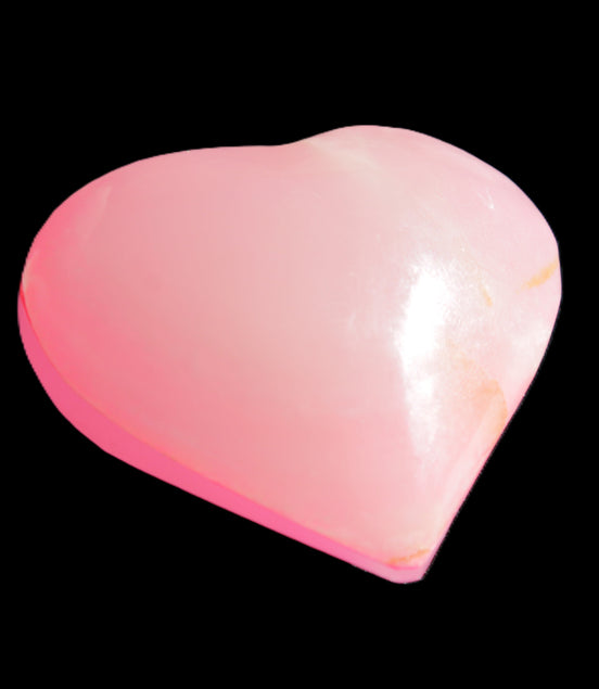 Pink-dyed Calcite heart 55*56mm 124.6g in sunlight - Rocks and Things Store