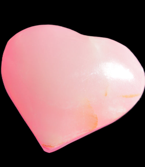 Pink-dyed Calcite heart 55*56mm 124.6g in sunlight - Rocks and Things Store