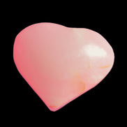 Pink-dyed Calcite heart 55*56mm 124.6g in sunlight - Rocks and Things Store