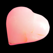 Pink-dyed Calcite heart 55*56mm 124.6g in sunlight - Rocks and Things Store