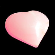 Pink-dyed Calcite heart 55*56mm 124.6g in sunlight - Rocks and Things Store