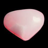 Pink-dyed Calcite heart 55*56mm 124.6g in sunlight - Rocks and Things Store
