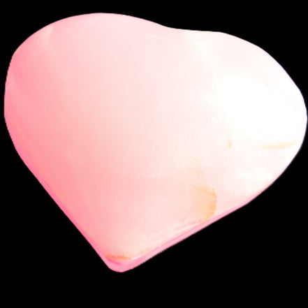 Pink-dyed Calcite heart 55*56mm 124.6g in sunlight - Rocks and Things Store