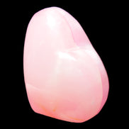 Pink-dyed Calcite heart 55*56mm 124.6g in sunlight - Rocks and Things Store