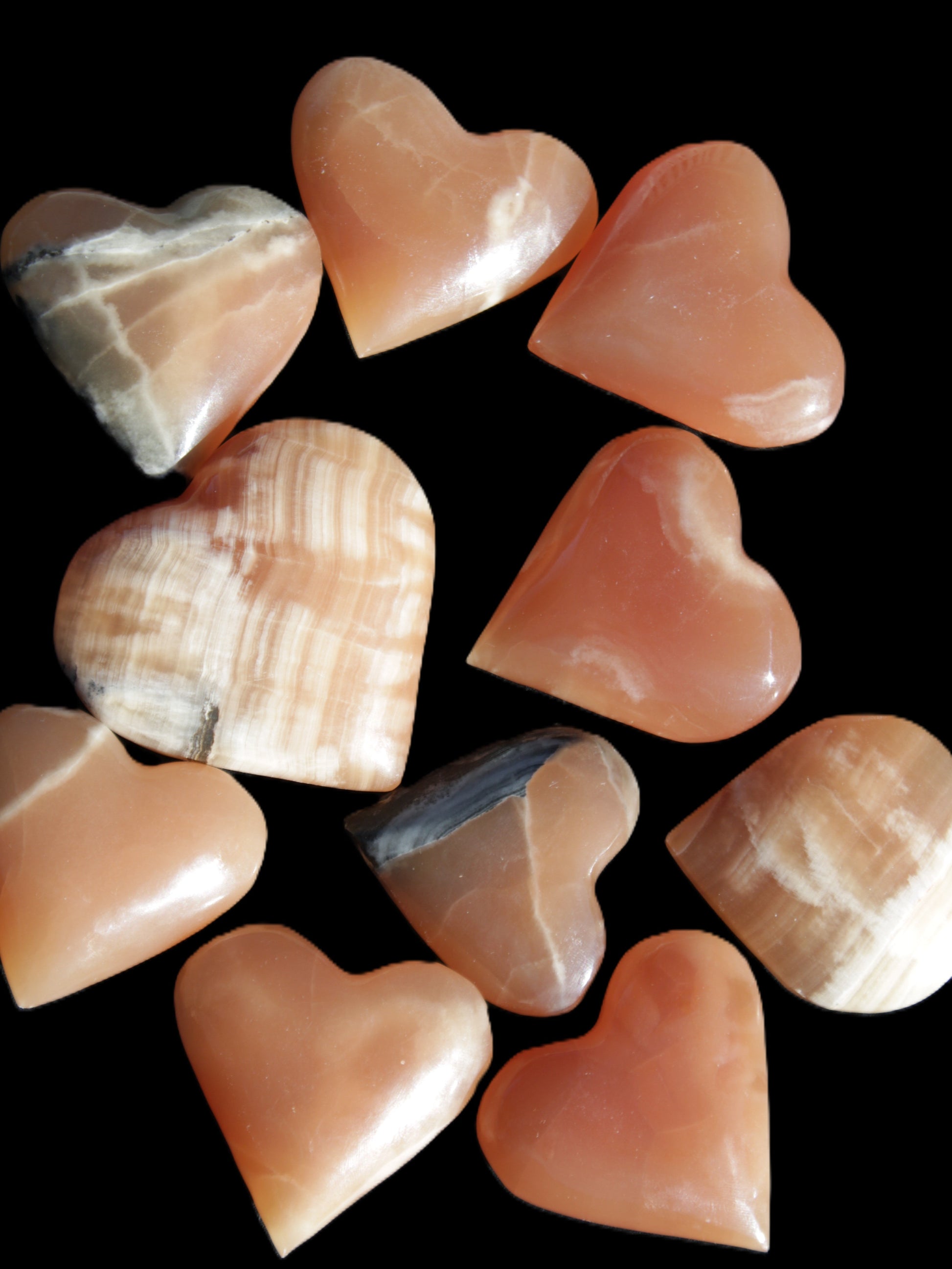 Ten Honey Calcite hearts selection 53-60mm 969g Wholesale Rocks and Things Store