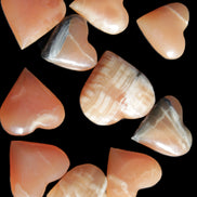 Ten Honey Calcite hearts selection 53-60mm 969g Wholesale Rocks and Things Store