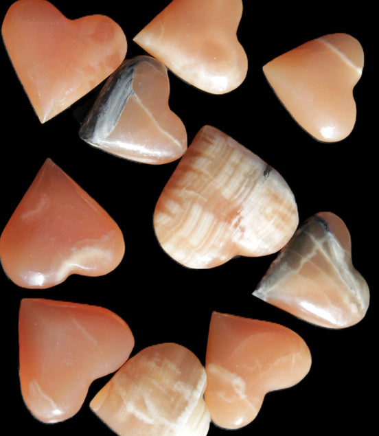 Ten Honey Calcite hearts selection 53-60mm 969g Wholesale Rocks and Things Store