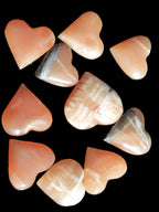 Ten Honey Calcite hearts selection 53-60mm 969g Wholesale Rocks and Things Store