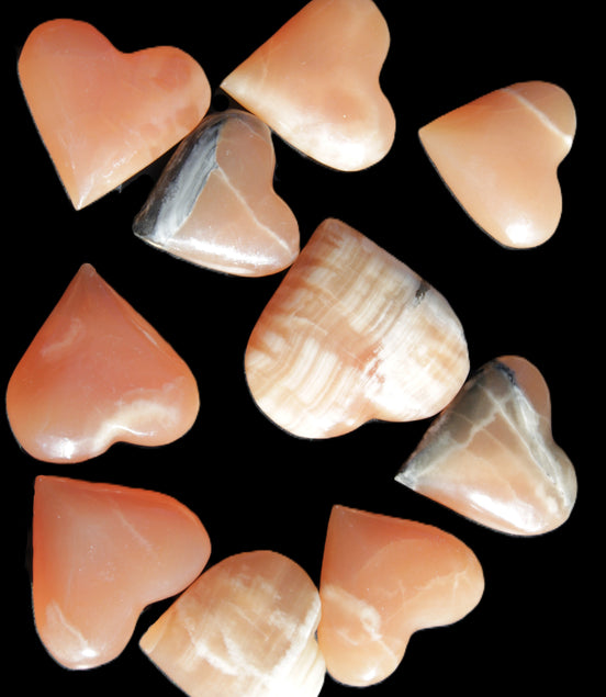 Ten Honey Calcite hearts selection 53-60mm 969g Wholesale Rocks and Things Store