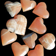 Ten Honey Calcite hearts selection 53-60mm 969g Wholesale Rocks and Things Store