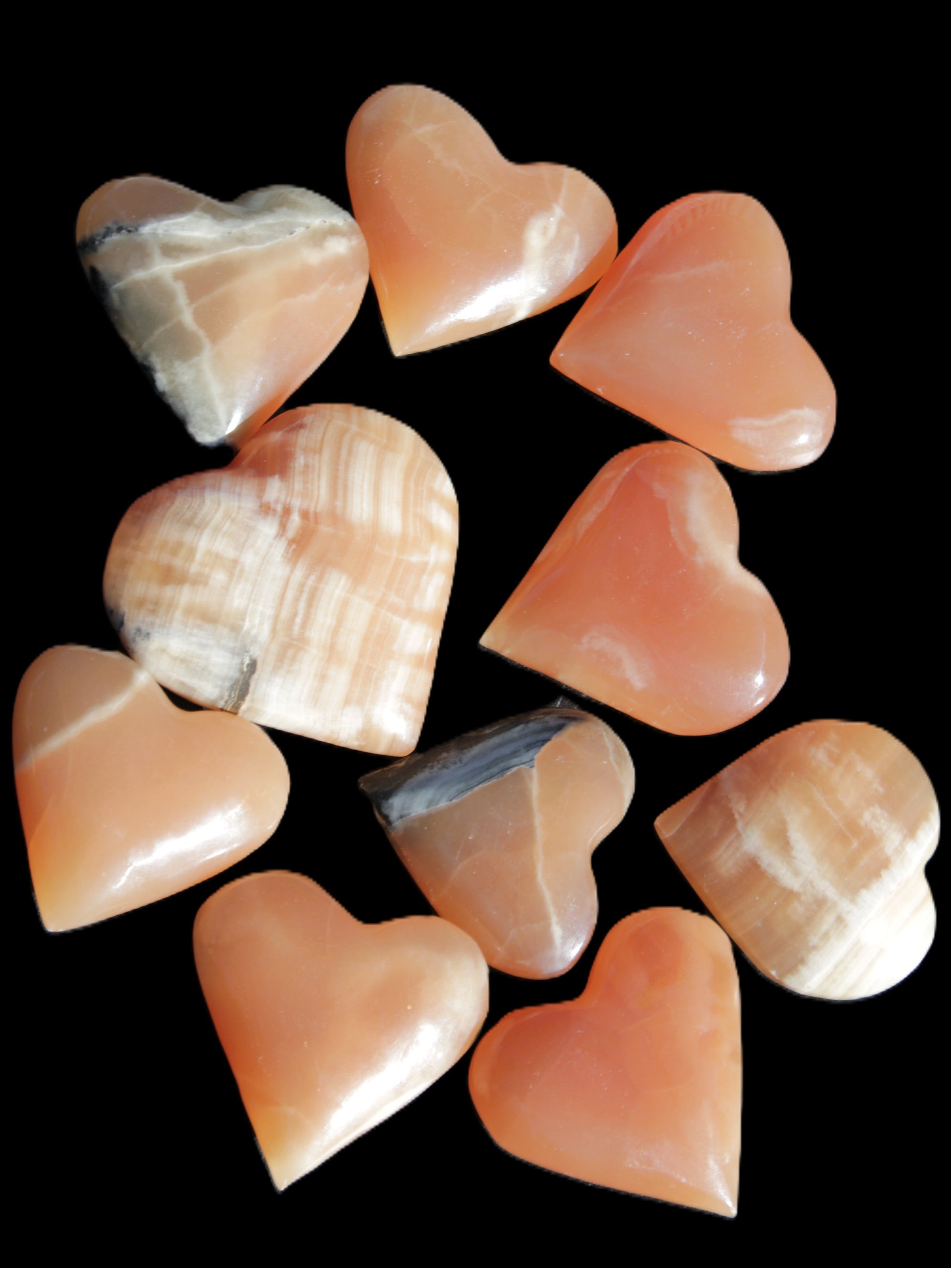 Ten Honey Calcite hearts selection 53-60mm 969g Wholesale Rocks and Things Store