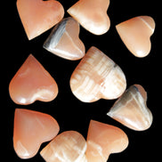Ten Honey Calcite hearts selection 53-60mm 969g Wholesale Rocks and Things Store