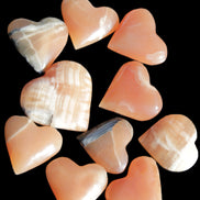 Ten Honey Calcite hearts selection 53-60mm 969g Wholesale Rocks and Things Store