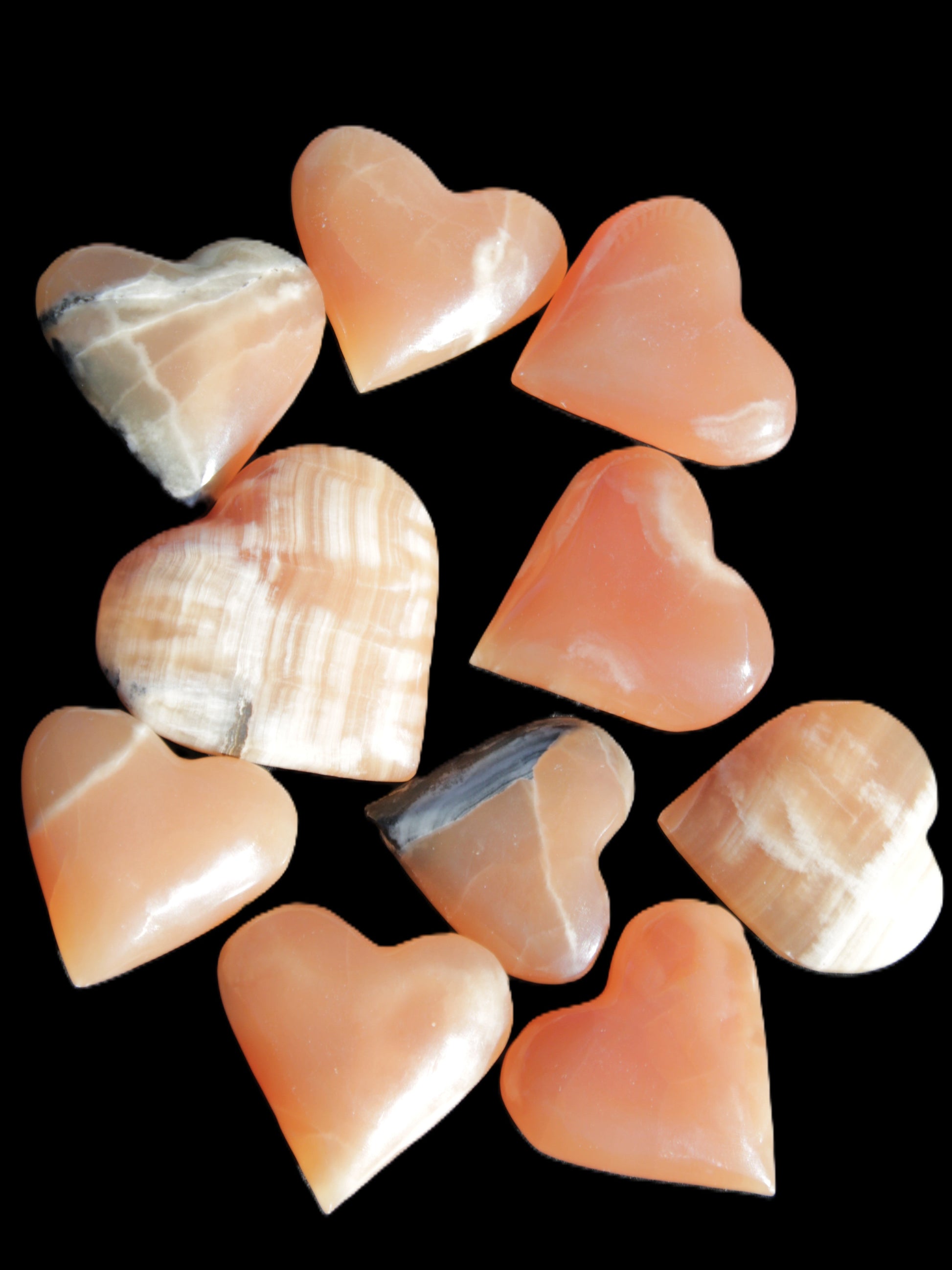 Ten Honey Calcite hearts selection 53-60mm 969g Wholesale Rocks and Things Store