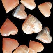 Ten Honey Calcite hearts selection 53-60mm 969g Wholesale Rocks and Things Store