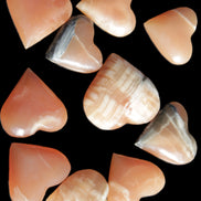 Ten Honey Calcite hearts selection 53-60mm 969g Wholesale Rocks and Things Store