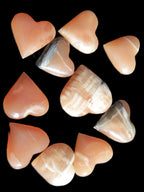 Ten Honey Calcite hearts selection 53-60mm 969g Wholesale Rocks and Things Store