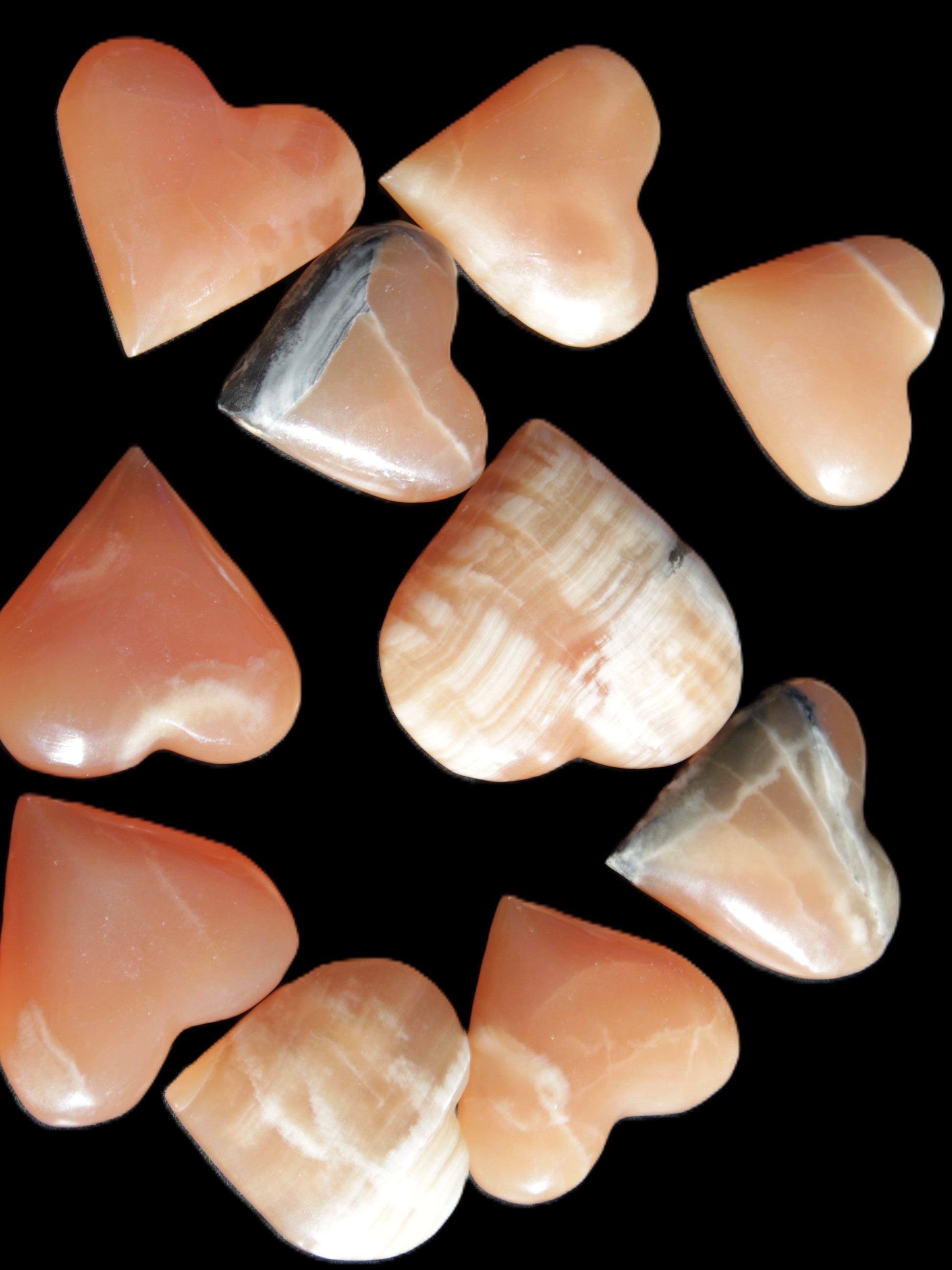 Ten Honey Calcite hearts selection 53-60mm 969g Wholesale Rocks and Things Store
