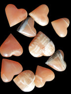 Ten Honey Calcite hearts selection 53-60mm 969g Wholesale Rocks and Things Store