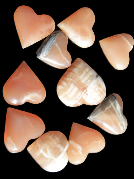 Ten Honey Calcite hearts selection 53-60mm 969g Wholesale Rocks and Things Store