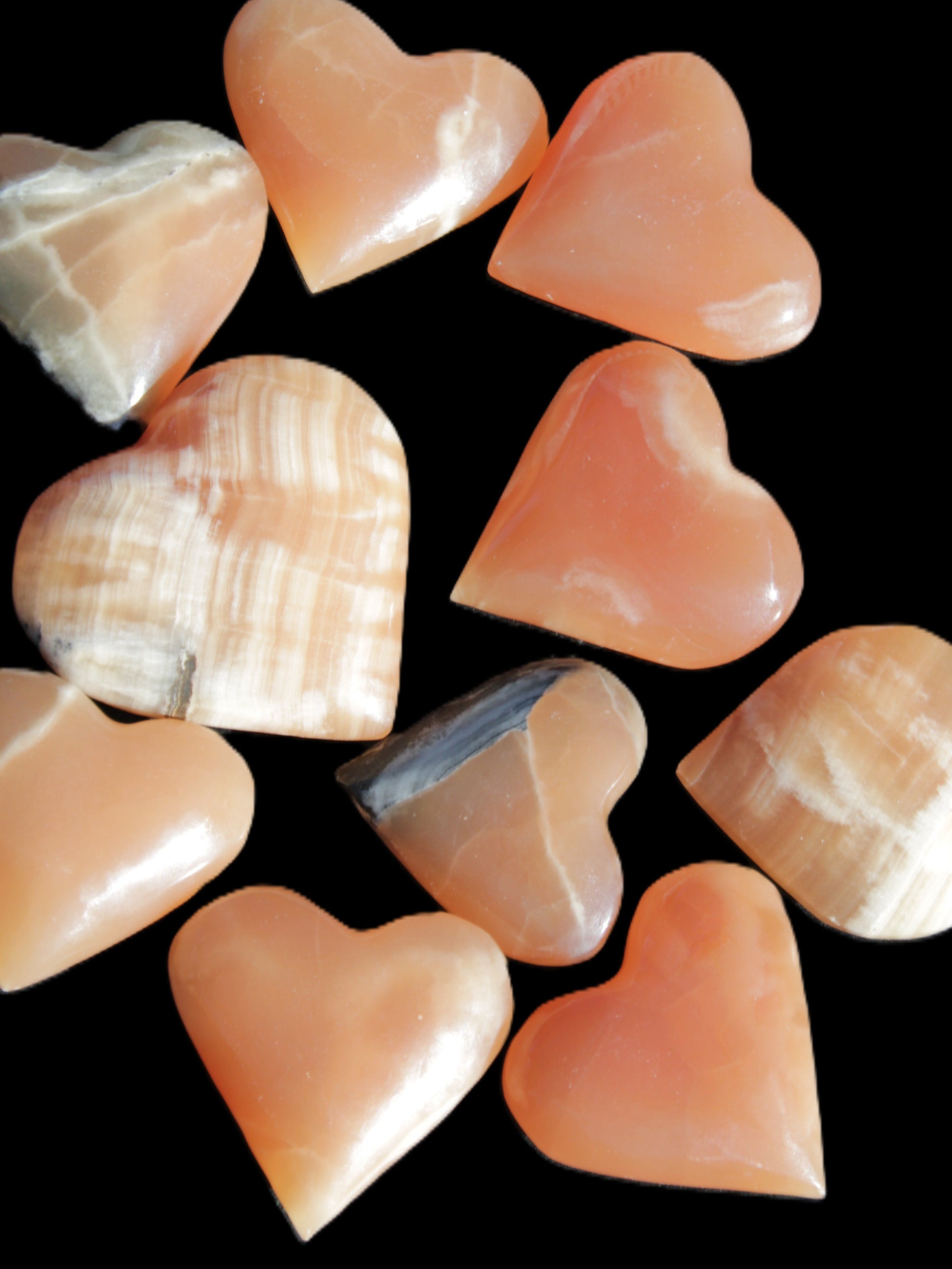 Ten Honey Calcite hearts selection 53-60mm 969g Wholesale Rocks and Things Store