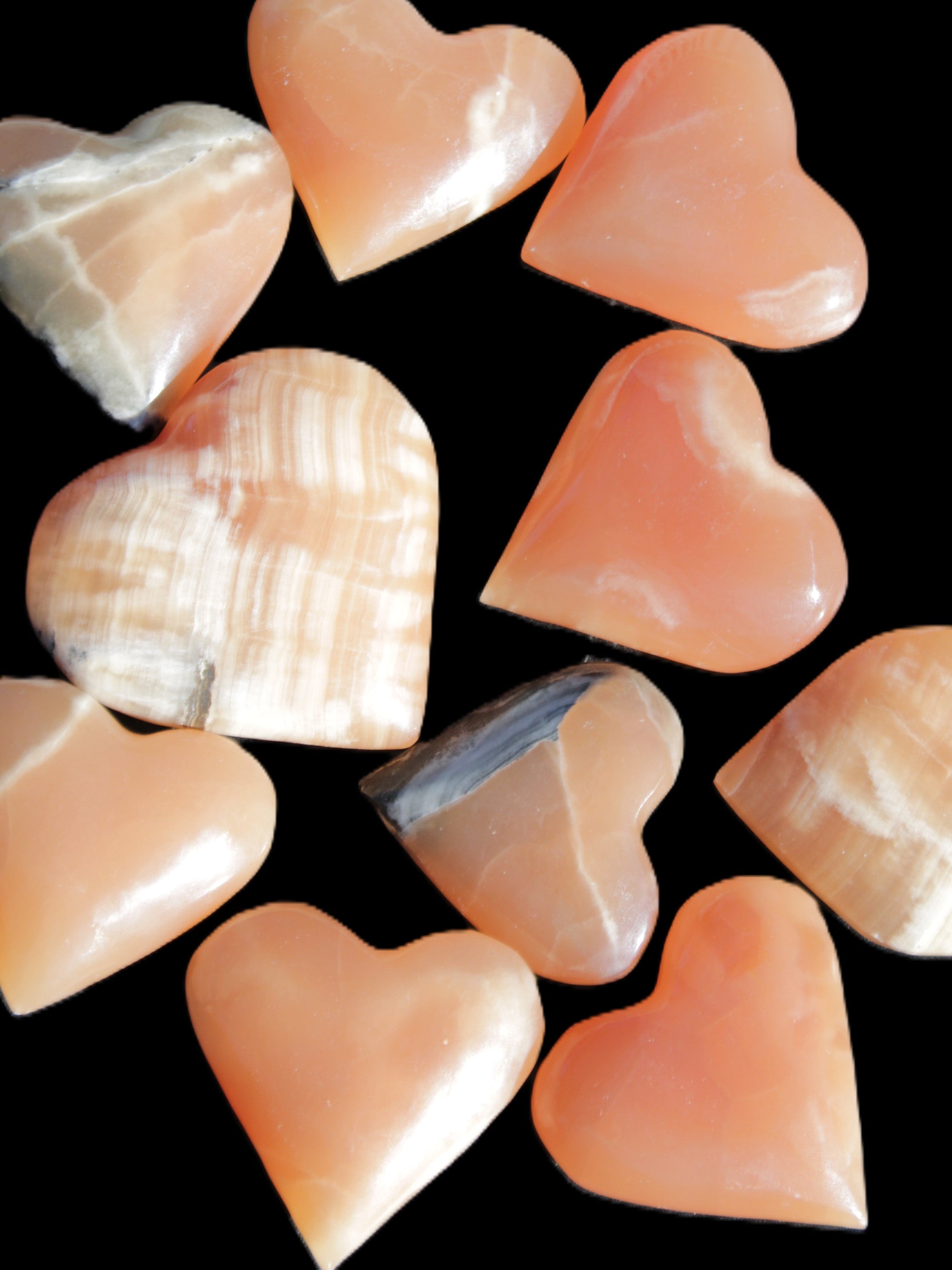 Ten Honey Calcite hearts selection 53-60mm 969g Wholesale Rocks and Things Store