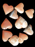 Ten Honey Calcite hearts selection 53-60mm 969g Wholesale Rocks and Things Store