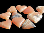 Ten Honey Calcite hearts selection 53-60mm 969g Wholesale Rocks and Things Store