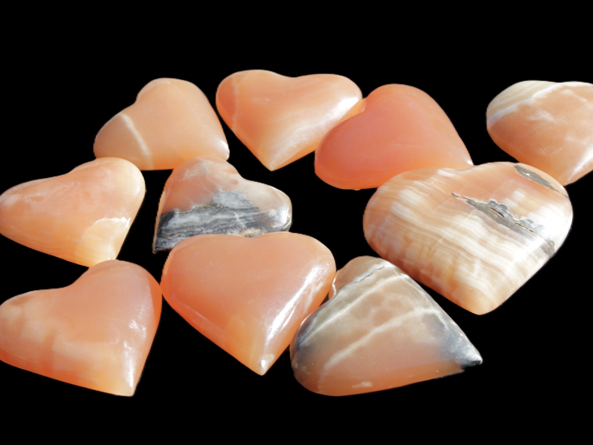 Ten Honey Calcite hearts selection 53-60mm 969g Wholesale Rocks and Things Store