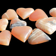 Ten Honey Calcite hearts selection 53-60mm 969g Wholesale Rocks and Things Store