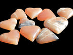 Ten Honey Calcite hearts selection 53-60mm 969g Wholesale Rocks and Things Store