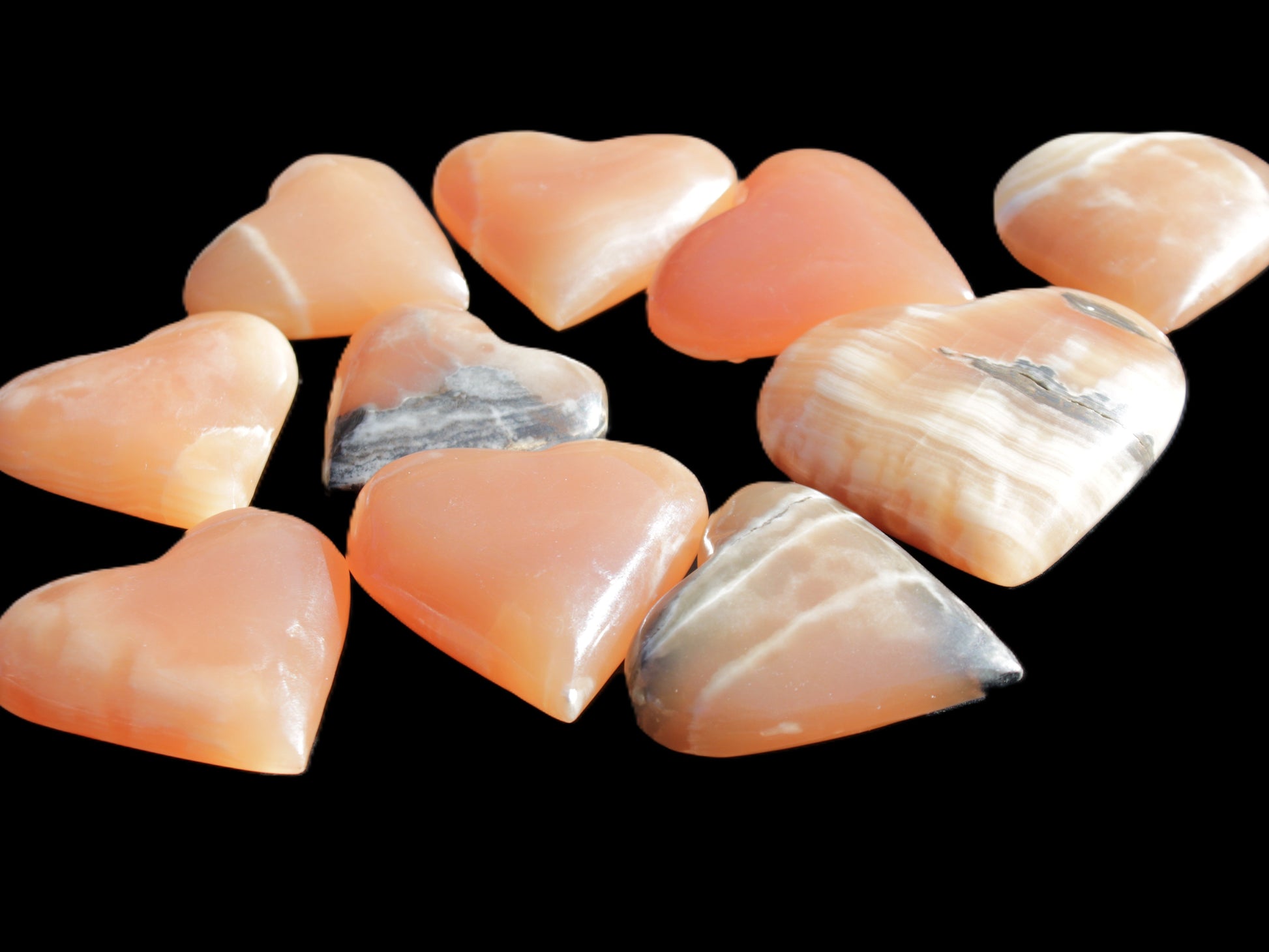 Ten Honey Calcite hearts selection 53-60mm 969g Wholesale Rocks and Things Store