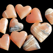 Ten Honey Calcite hearts selection 53-60mm 969g Wholesale Rocks and Things Store