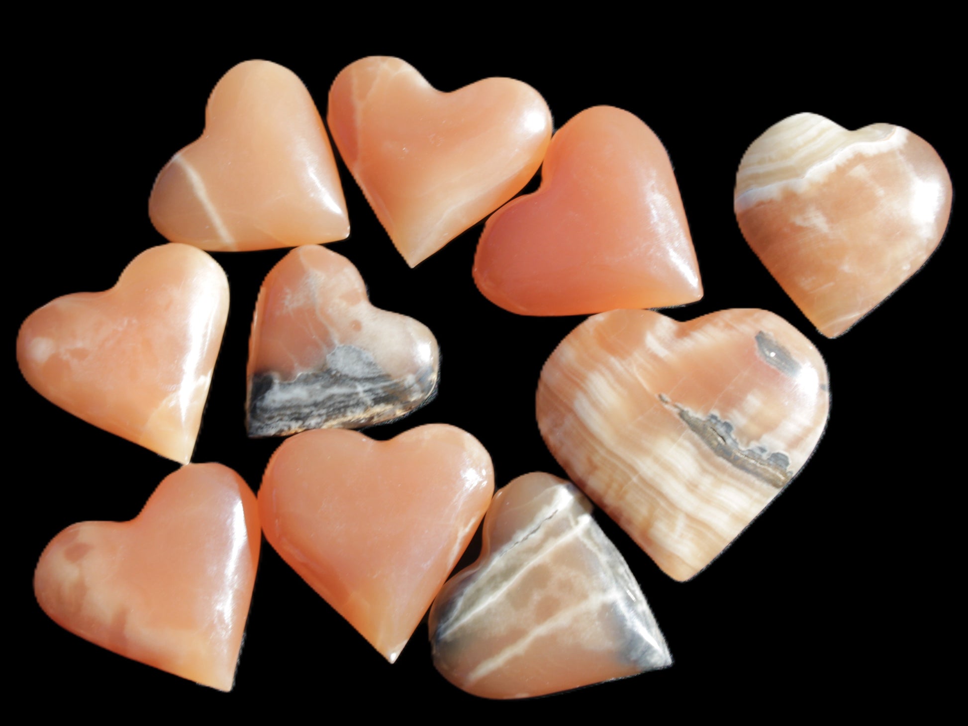 Ten Honey Calcite hearts selection 53-60mm 969g Wholesale Rocks and Things Store