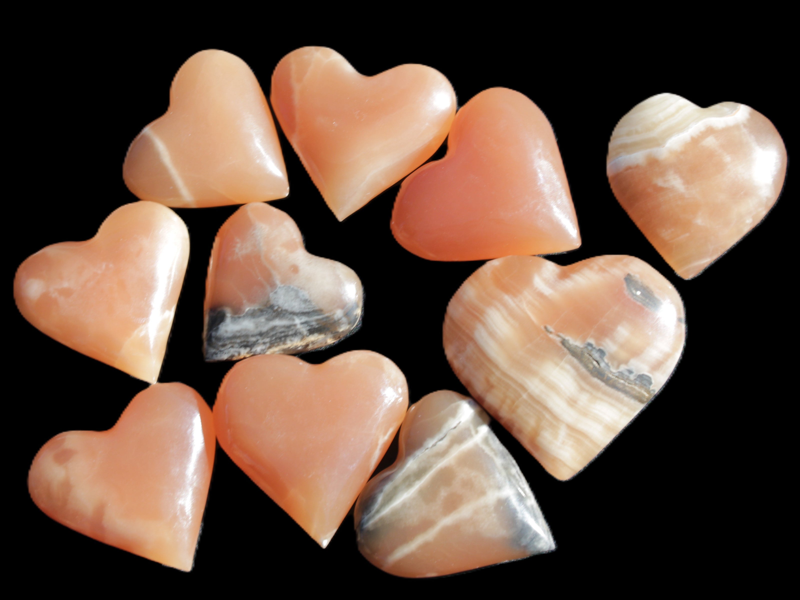 Ten Honey Calcite hearts selection 53-60mm 969g Wholesale Rocks and Things Store