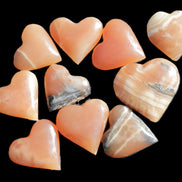 Ten Honey Calcite hearts selection 53-60mm 969g Wholesale Rocks and Things Store