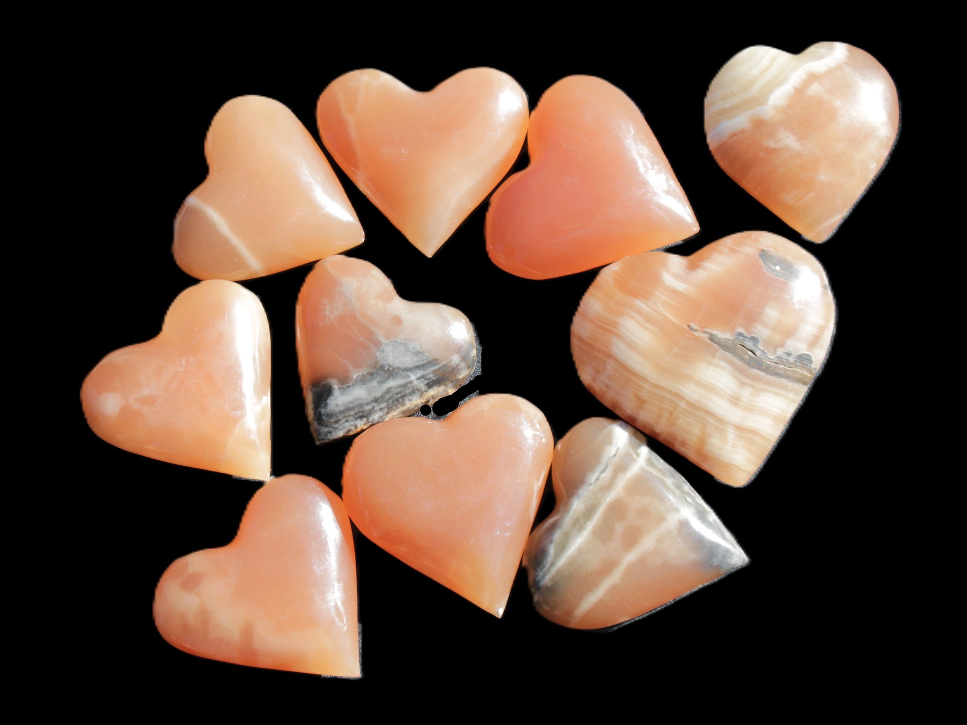 Ten Honey Calcite hearts selection 53-60mm 969g Wholesale Rocks and Things Store