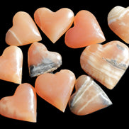 Ten Honey Calcite hearts selection 53-60mm 969g Wholesale Rocks and Things Store