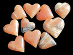 Ten Honey Calcite hearts selection 53-60mm 969g Wholesale Rocks and Things Store